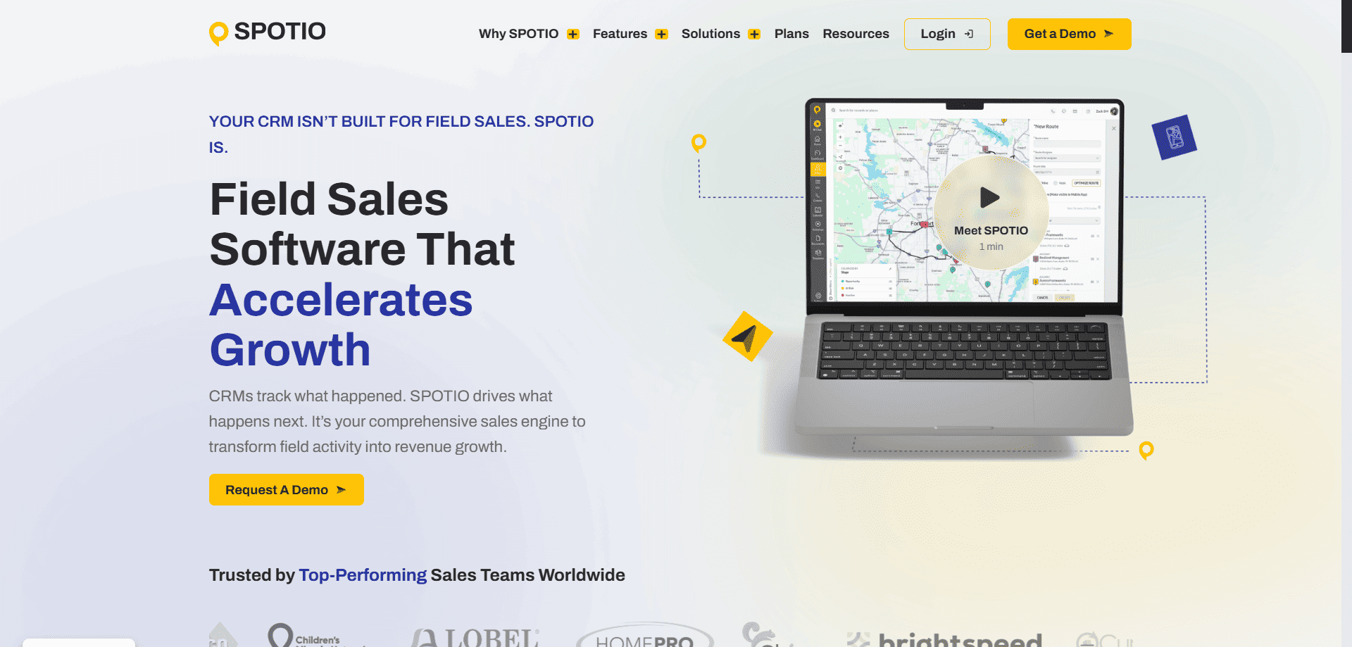 SPOTIO homepage screenshot with Outside Sales Rep Software, growth headline, map on laptop, nav bar, and bold yellow demo buttons.