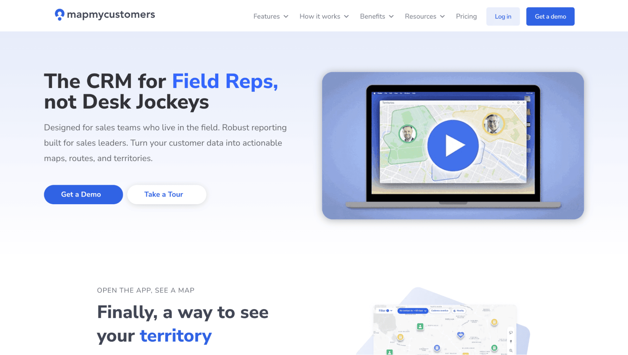 Map My Customers homepage with CRM for field reps headline, demo and tour buttons, and a laptop map image showcasing sales software.