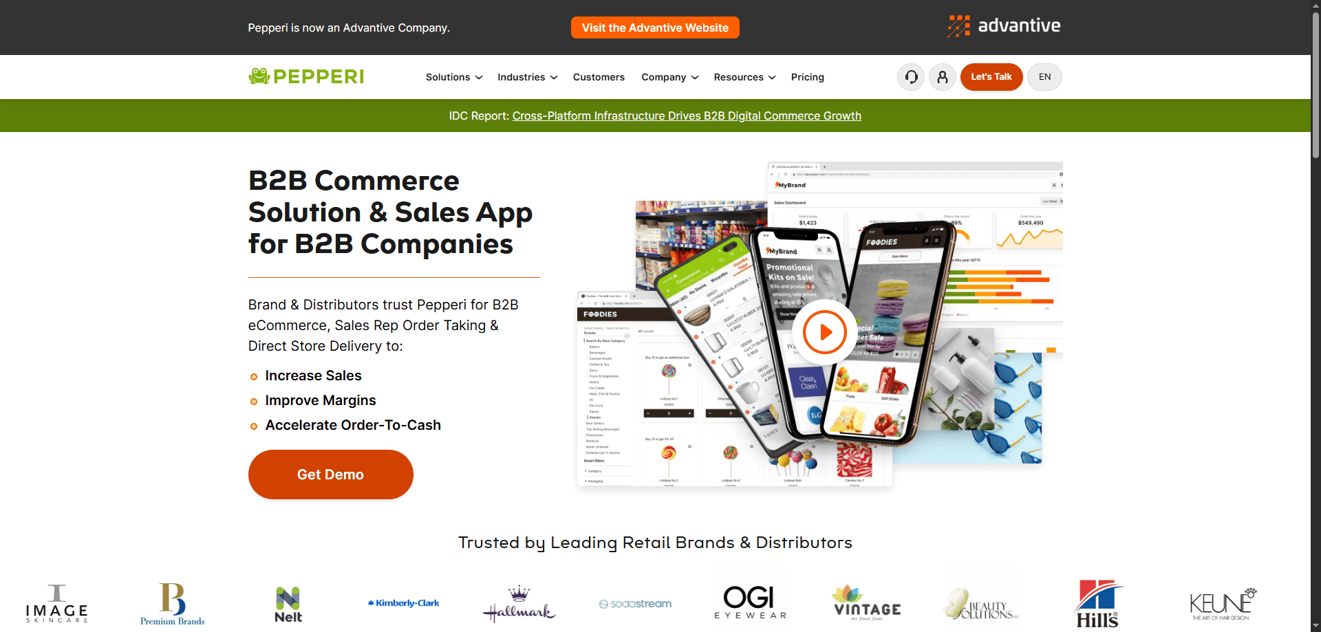 Pepperi homepage screenshot showcasing B2B commerce solutions, sales app features, device images, navigation bar, and brand logos.